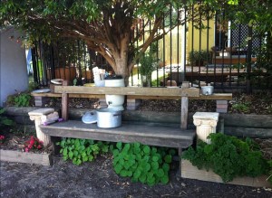 Kids' neighbourhood kitchen verge garden with seat for supervision