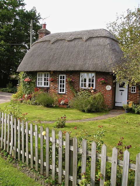 A thatched cottage in England and it's garden